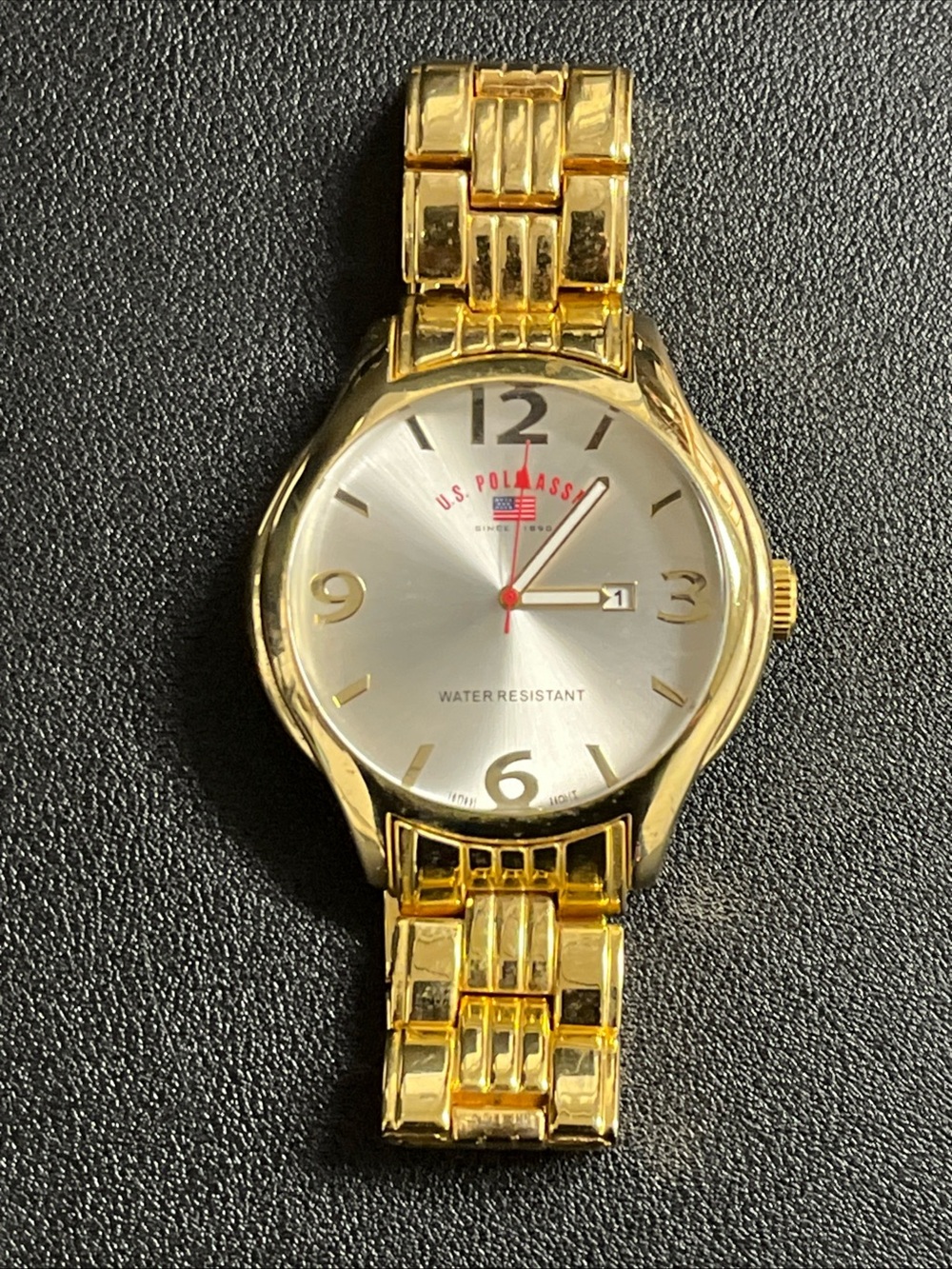 U.S. Polo Assn. Gold Tone Men's Bracelet Watch with Silver Dial. Has new battery